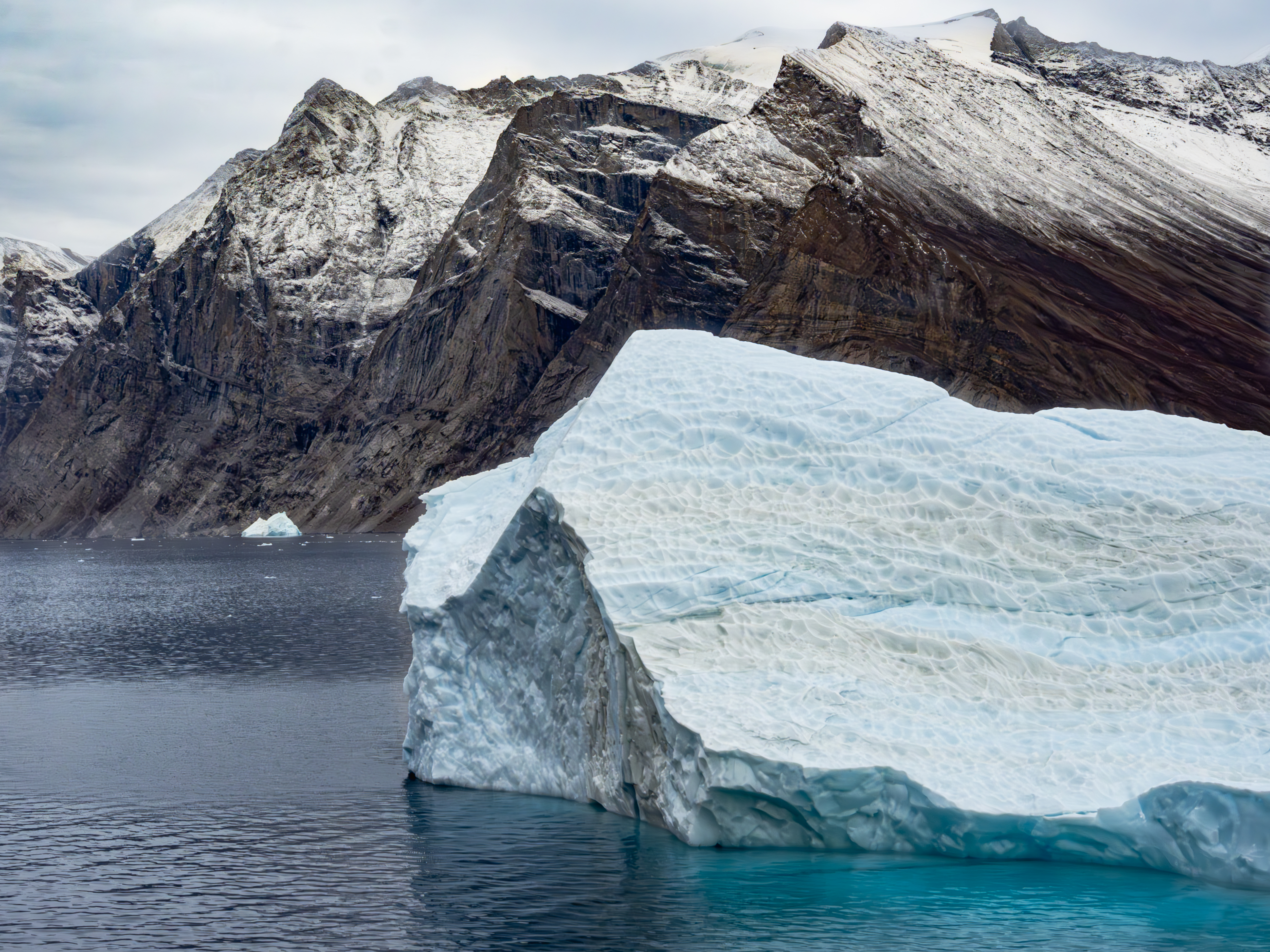 Tabular iceberg in a fjord