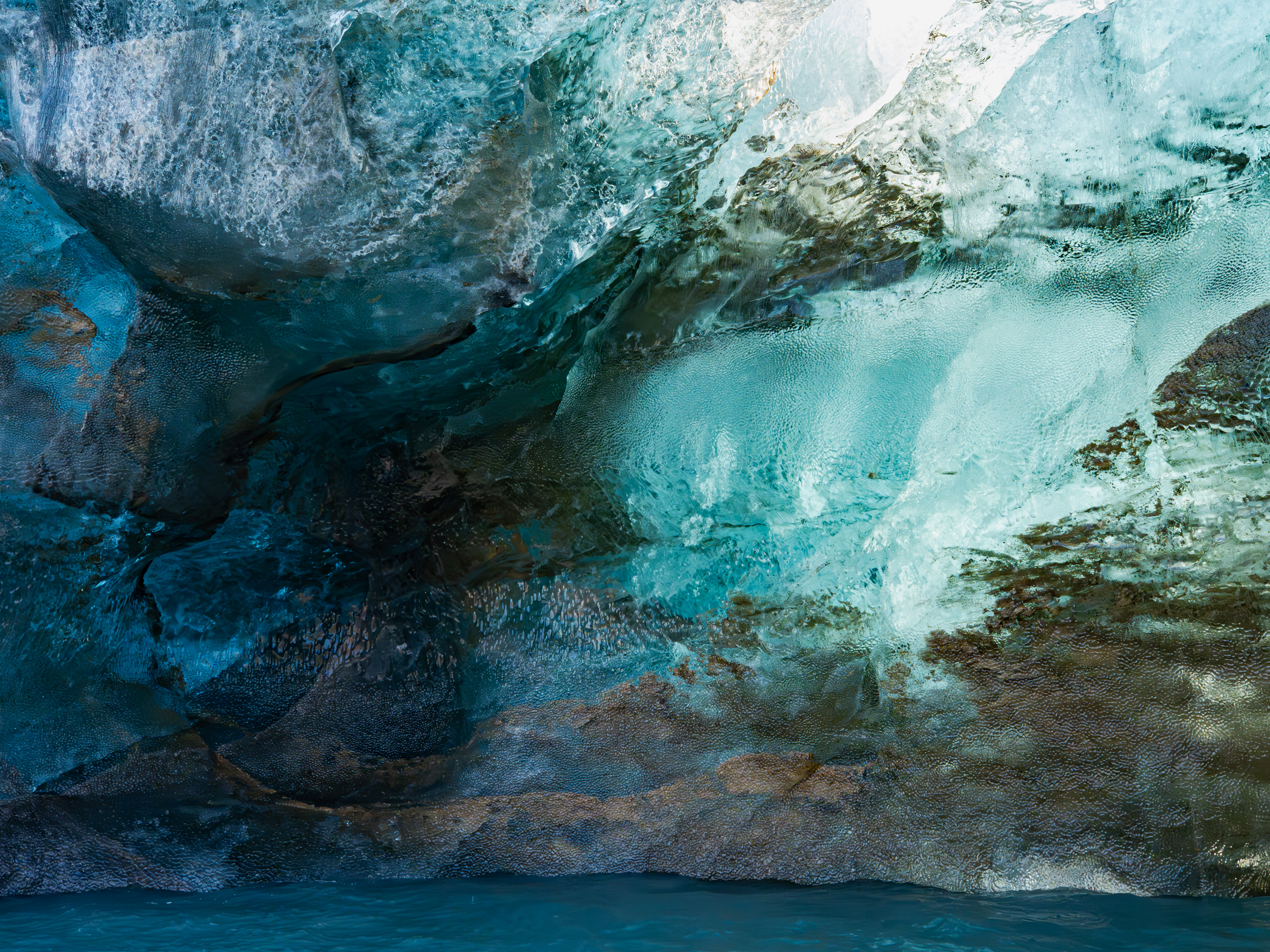 Close view of blue glacier ice from underneath